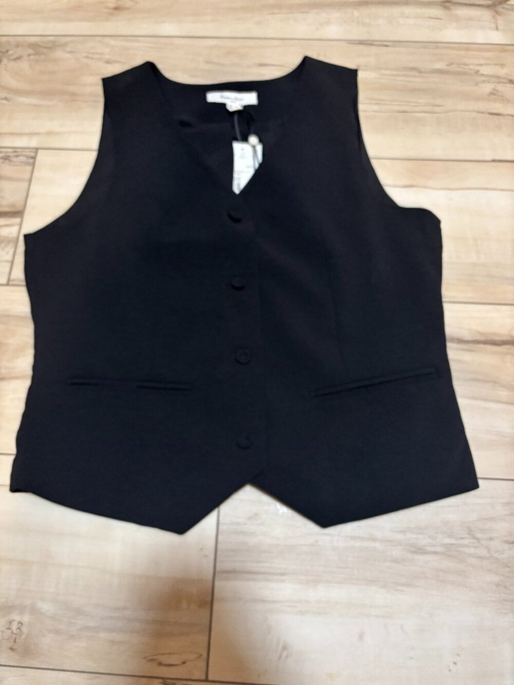 Black button-front vest (NWT)